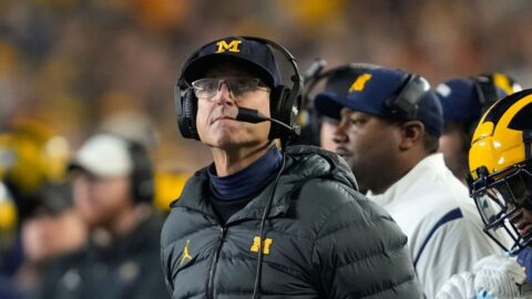 Michigan says 1,000th win should go to Jim Harbaugh, even if suspended