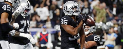 Raiders hang team-record 63 points on banged-up Chargers