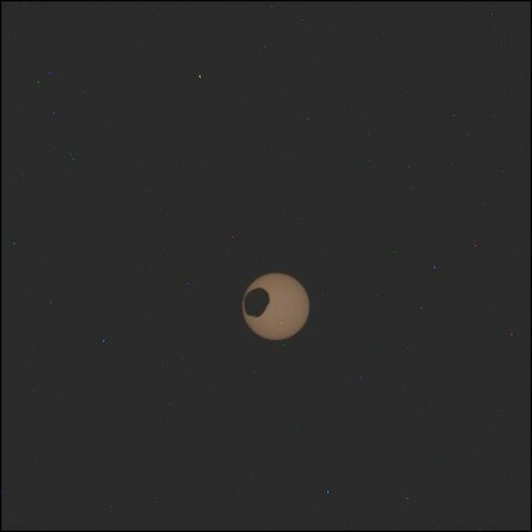 NASA Mars rover looks up, sees its strange moon eclipsing the sun