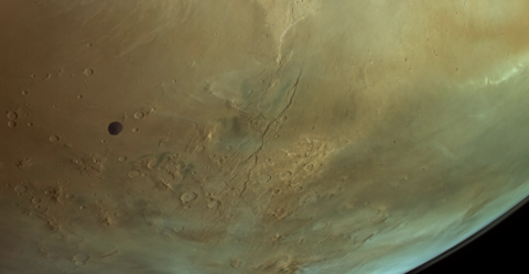 Mars spacecraft snaps glorious view of Martian volcanoes — and a surprise
