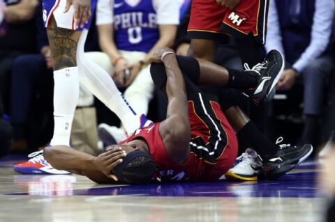 Heat’s Jimmy Butler injures knee in play-in loss, set for MRI